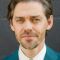 Tom Payne Photo